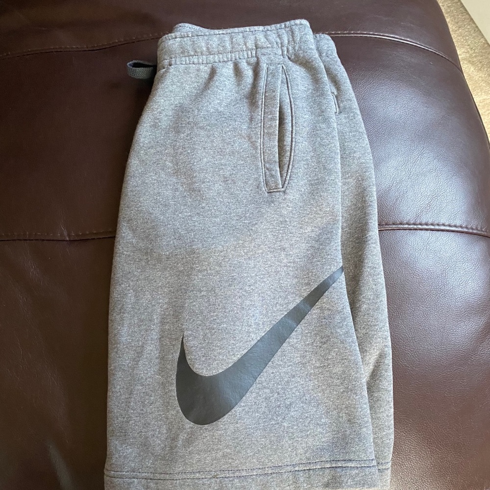 Dark grey Nike sweatpant shorts